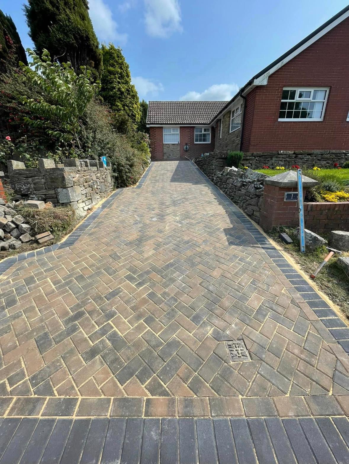 Block paved driveway with decorative edging
